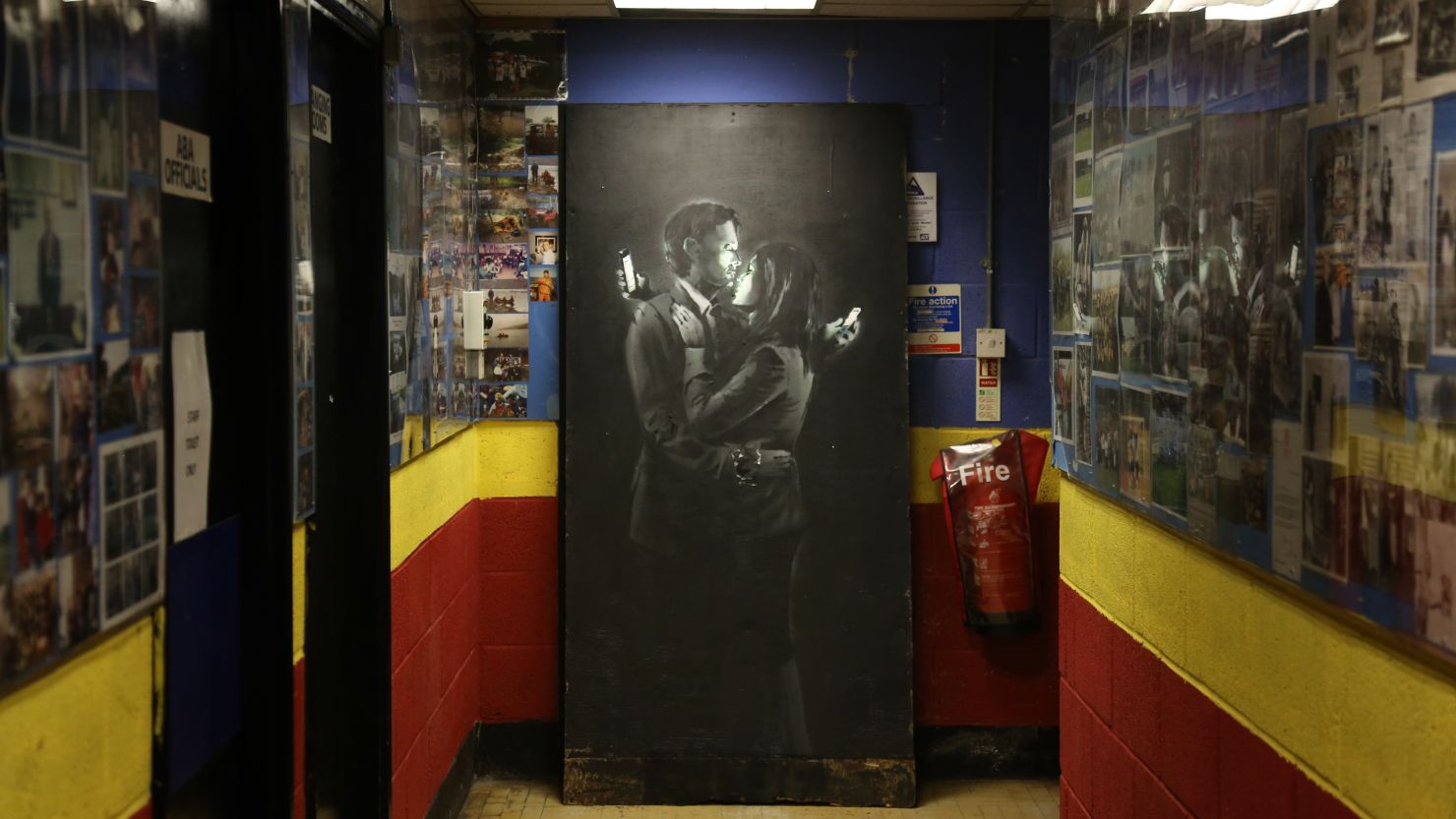 New Banksy artwork, Mobile Lovers, displayed inside the Broad Plain Boys youth center on April 16, 2014 in Bristol, England. 