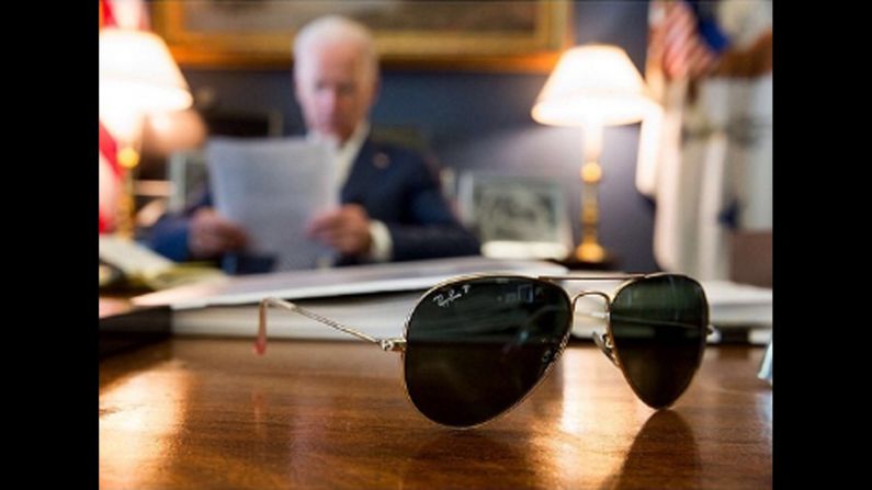 U.S. Vice President Joe Biden has joined the popular photo-sharing website Instagram, and <a href="index.php?page=&url=http%3A%2F%2Finstagram.com%2Fp%2Fm264zNlwTT%2F" target="_blank" target="_blank">the first uploaded picture</a> shows Biden's aviator glasses with the vice president reading in the background. The caption with the photo said Biden will travel to Pennsylvania to tout a jobs plan with President Obama, and it promised more pictures of Biden's sunglasses to come. Click through the gallery to see more photos of Biden and what has become his signature eyewear.