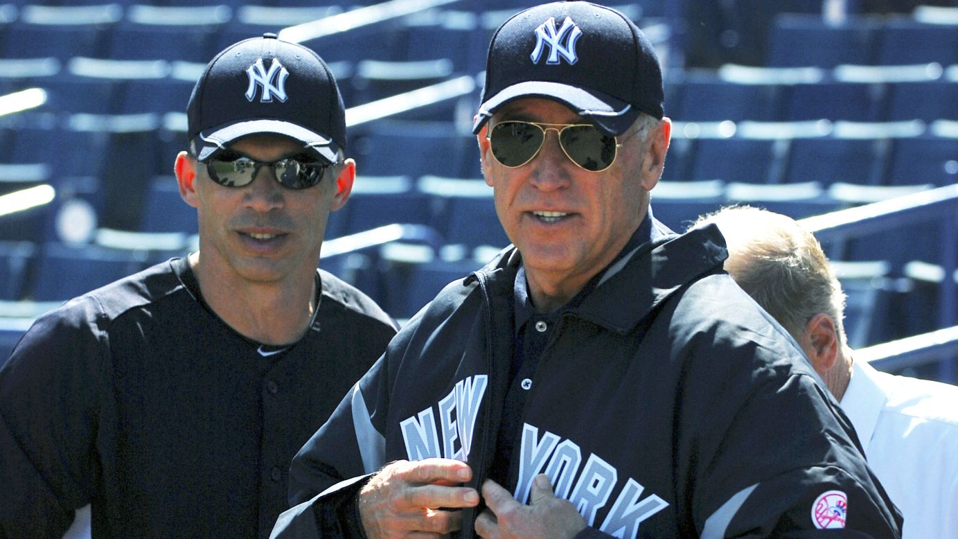 Biden chats with New York Yankees manager Joe Girardi during a Yankees practice in Tampa, Florida, in March 2011.