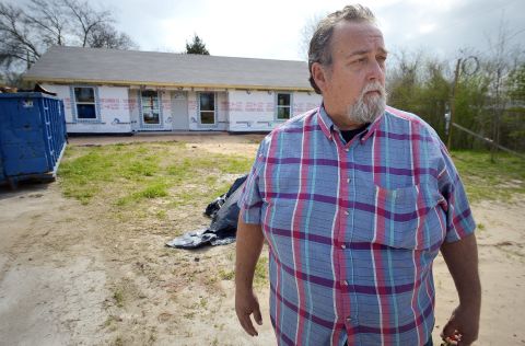 John Raimer stands in front of a house in West, Texas, that was built by 60 volunteers from Oklahoma and Arkansas. Raimer is the construction chief for the West Long-Term Recovery Center.