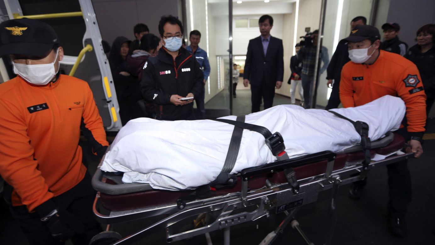 The body of a victim is moved at a hospital in Mokpo on April 17.