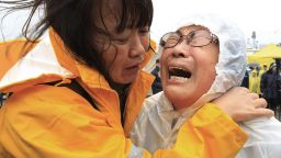 Relatives of a passenger aboard the ferry cry at a port in Jindo as they wait for news on the rescue operation on April 17.