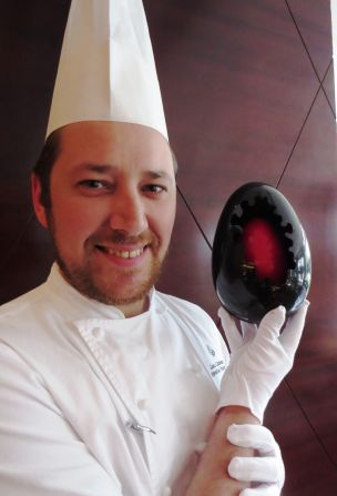 Loic Carbonnet, the head pastry chef at the <a href="index.php?page=&url=http%3A%2F%2Fpress.fourseasons.com%2Flondon%2Fhotel-news%2F2014%2Ffour-seasons-hotel-london-at-park-lane-creates-easter-eggs-with-a-twist%2F" target="_blank" target="_blank">Four Seasons Hotel London at Park Lane</a>, spent 25 days making 50 haute eggs. Each egg, which costs $125, is actually an egg (7cm) inside an egg (13cm) inside an egg (22cm). Carbonnet spent seven hours crafting the first egg. He had to be careful to watch the temperature. The process involves heating chocolate to 50 degrees Celsius, then cooling it to 28 degrees, and then raising the temperature to 31 degrees to shape it.