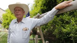 Rancher Cliven Bundy poses for a photo outside his ranch house on April 11, 2014 west of Mesquite, Nevada. Bureau of Land Management officials are rounding up Cliven Bundy's cattle, he has been locked in a dispute with the BLM for a couple of decades over grazing rights