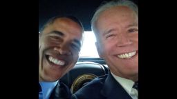 President Barack Obama and Vice president Joe Biden pose for a selfie.