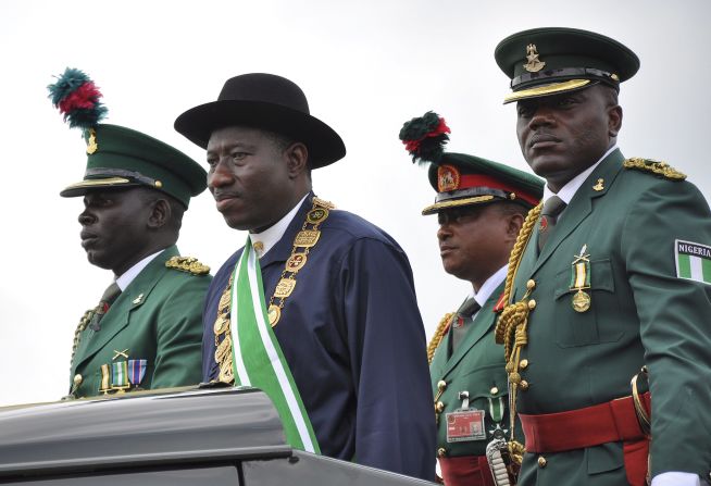 Nigerian President Goodluck Jonathan, second from left, stands on the back of a vehicle after being <a href="index.php?page=&url=http%3A%2F%2Fwww.cnn.com%2F2011%2FWORLD%2Fafrica%2F05%2F29%2Fnigeria.president.inauguration%2Findex.html">sworn-in as President </a>during a ceremony in the capital of Abuja on May 29, 2011. In December 2011, Jonathan declared a <a href="index.php?page=&url=http%3A%2F%2Fwww.cnn.com%2F2011%2F12%2F31%2Fworld%2Fafrica%2Fnigeria-state-of-emergency%2F">state of emergency</a> in parts of the country afflicted by violence from Boko Haram.