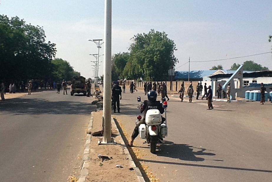 Soldiers stand outside the 79 Composite Group Air Force base that was attacked earlier in Maiduguri on December 2, 2013.<a href="http://edition.cnn.com/2013/12/02/world/africa/boko-haram-attack/"> Hundreds of Boko Haram militants attacked</a> an Air Force base and a military checkpoint, according to government officials.