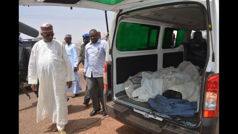 Yobe state Gov. Ibrahim Gaidam, left, looks at the bodies of students inside an ambulance outside a mosque in Damaturu. At least 29 students died in an <a href="http://edition.cnn.com/2014/02/25/world/africa/nigeria-school-attack/">attack on a federal college </a>in Buni Yadi, near the capital of Yobe state, Nigeria's military said on February 26, 2014. Authorities suspect Boko Haram carried out the assault in which several buildings were also torched.