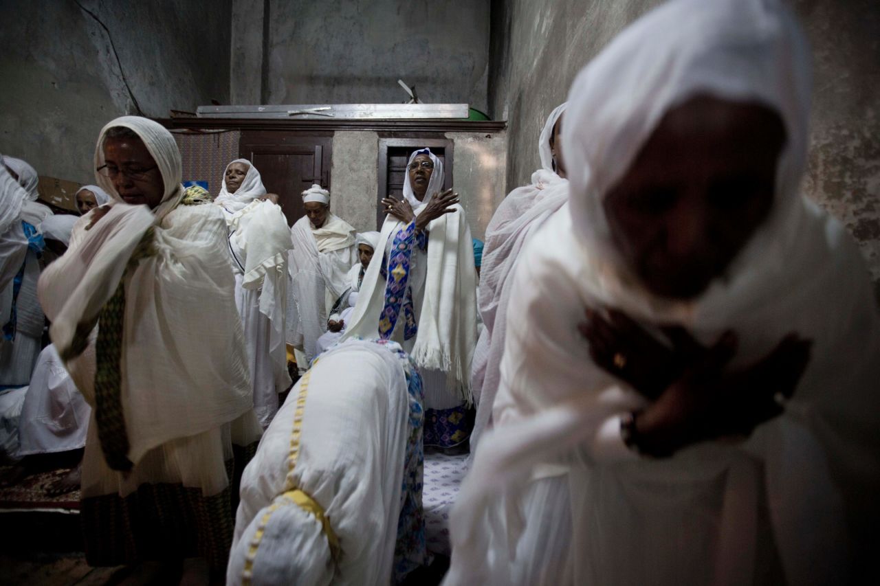 Ethiopian Orthodox women pray at the Deir El Sultan monastery during the Washing of the Feet ceremony outside the Church of the Holy Sepulchre in Jerusalem on April 17. The church is traditionally believed by many to be the site of the crucifixion and burial of Jesus Christ.