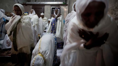 Ethiopian Orthodox women pray at the Deir El Sultan monastery during the Washing of the Feet ceremony outside the Church of the Holy Sepulchre in Jerusalem on April 17. The church is traditionally believed by many to be the site of the crucifixion and burial of Jesus Christ.