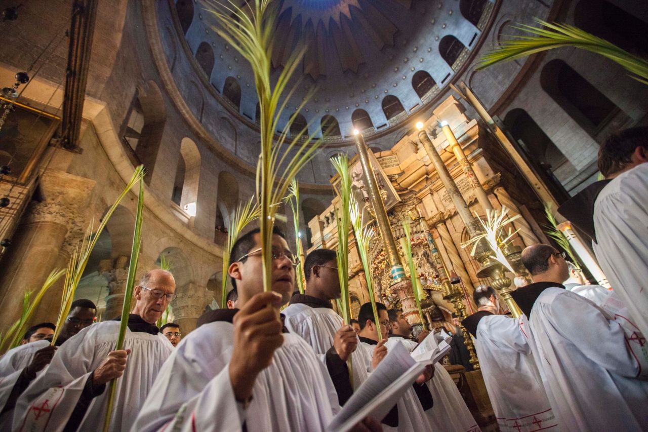 Roman Catholics celebrate at the Church of the Holy Sepulchre in Jerusalem on April 14.