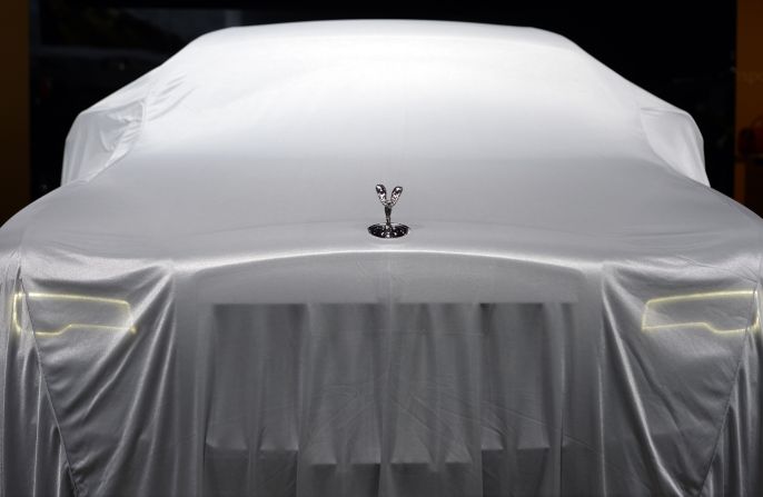 The Rolls-Royce Ghost Series II waits to be unveiled at the New York International Auto Show on Wednesday, April 16. The auto show is open April 18-27 at the Jacob Javits Center in New York City.