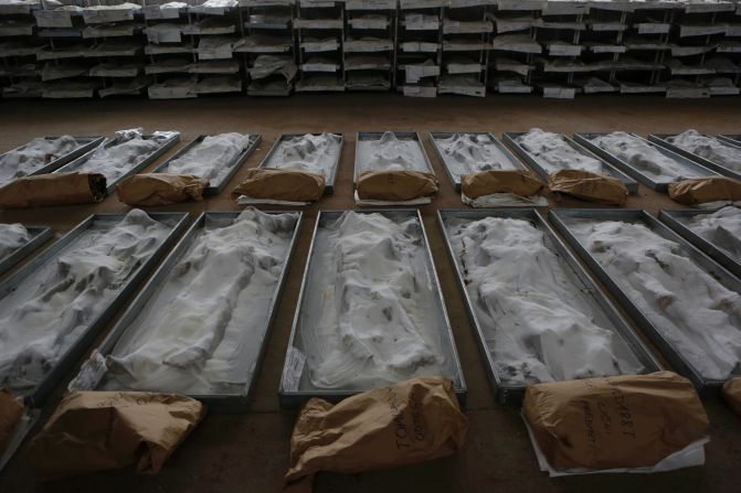Body remains, conserved with salt, are displayed at the Sejkovaca identification center near the Bosnian town of Sanski Most on Wednesday, April 16. The remains, <a href="http://www.cnn.com/2013/11/01/world/europe/bosnia-mass-grave/index.html">found in a mass grave last year</a>, are believed to be those of victims of Bosniak and Croat ethnicity who were killed in the summer of 1992, according to the Prosecutor's Office of Bosnia and Herzegovina. The mass grave, at Tomasica in Prijedor municipality, is one of the biggest found in Bosnia and Herzegovina since the breakup of the former Yugoslavia two decades ago.