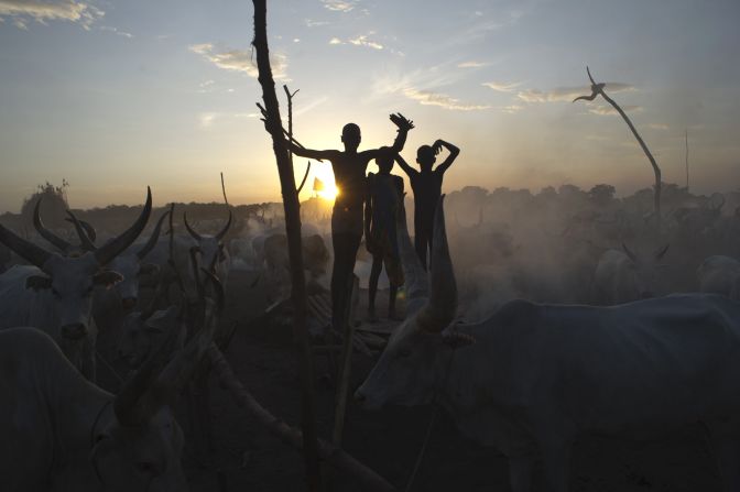 Cattle herders stand among their animals in Terekeka, South Sudan, on Sunday, April 13. The conflict in South Sudan has triggered a serious risk of famine, the United Nations has warned. <a href="http://www.cnn.com/2014/04/11/world/gallery/week-in-photos-0411/index.html">See last week in 27 photos</a>