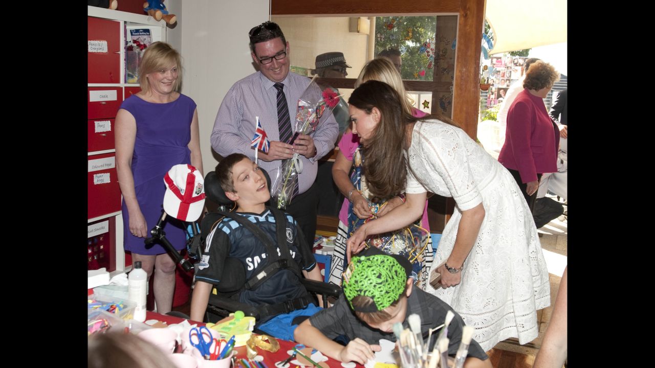 Catherine speaks with a child at the Bear Cottage Hospice on April 18 in Sydney. 