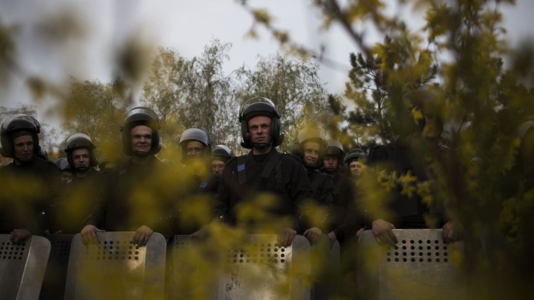 Ukrainian riot police officers stand guard during a pro-Ukrainian demonstration in Donetsk on April 17.