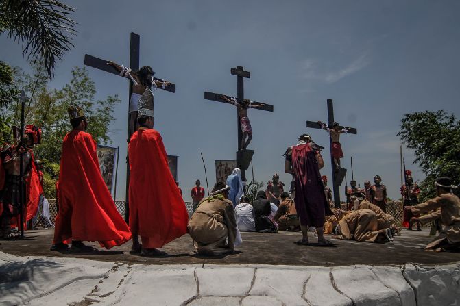 Penitents in San Fernando, Philippines, hang from wooden crosses on Good Friday as they take part in a re-enactment of Jesus Christ's crucifixion. 