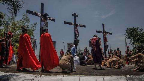 Penitents in San Fernando, Philippines, hang from wooden crosses on Good Friday as they take part in a re-enactment of Jesus Christ's crucifixion.