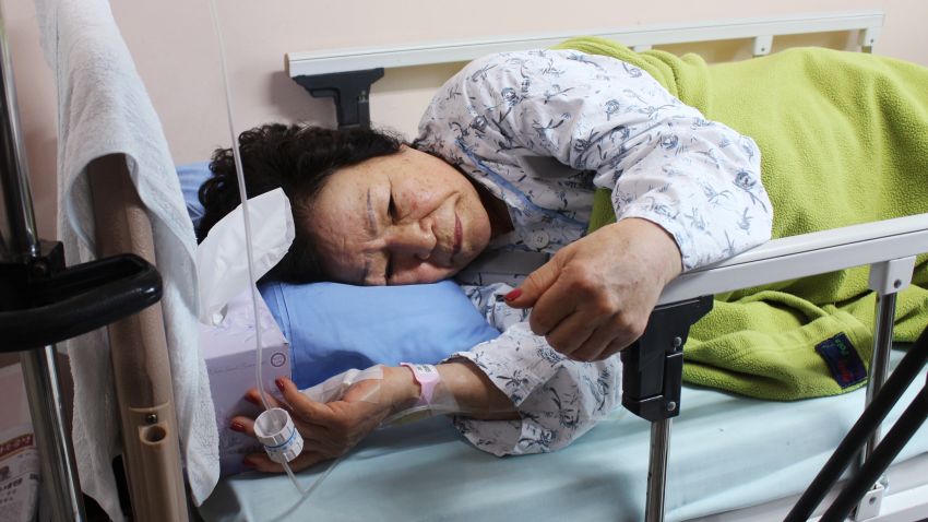 Shin Young Ja, 71, of Seoul was aboard the Sewol ferry when it capsized Wednesday. She is resting at a nearby hospital after breaking her back, and suffering glass injuries on her foot.