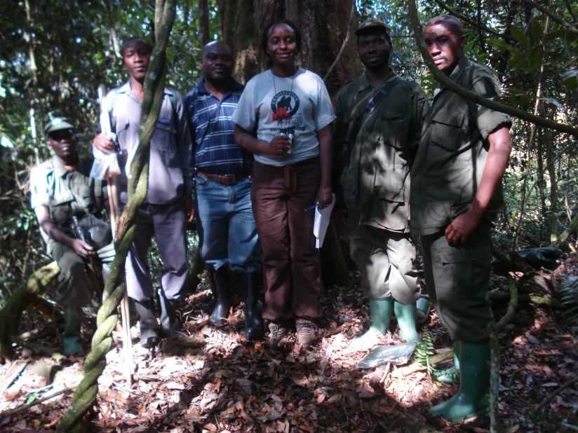 Kalema-Zikusoka (pictured center) poses with a group of trainee rangers in May 2008. Kalema-Zikusoka says that  when the conservation land was established, many people who were previously poachers were employed as rangers and trackers. "We call them 'born again poachers," she says.