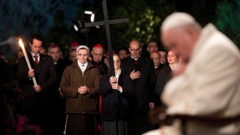 Pope Francis prays during the Stations of the Cross ceremony at the Colosseum in Rome on April 18.