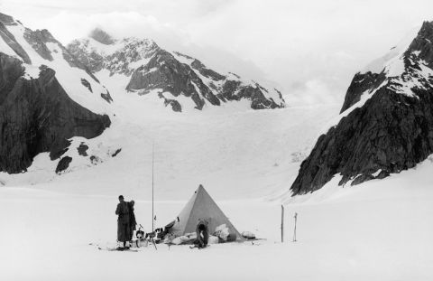 Mountaineers are seen preparing to leave their camp during one of Eric Shipton's early expeditions on Everest in the 1930s. While Shipton never made it to the summit, his exploration of the mountain paved the way for others. 