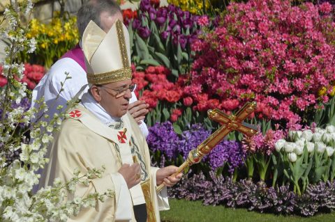 Pope Francis arrives at St. Peter's Square for Easter Mass on Sunday, April 20, in Vatican City. Easter Sunday celebrates the Christian belief in Jesus' resurrection.
