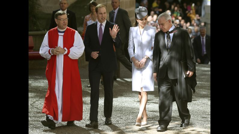 Britain's Prince William, second from left, and his wife, the Duchess of Cambridge, walk with Archbishop Glenn Davies, left, and the Rev. Phillip Jensen, dean of Sydney at St. Andrew's Cathedral, as they arrive at the cathedral for Easter Sunday church services in Sydney.