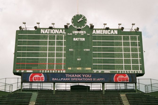 Wrigley Field is one of the last parks to maintain a hand-turned scoreboard. No batted ball has ever hit the 1937 scoreboard, though pro-golfer Sam Snead <a href="index.php?page=&url=http%3A%2F%2Fwww.ballparks.com%2Fbaseball%2Fnational%2Fwrigle.htm" target="_blank" target="_blank">hit it with a golf ball</a> from home plate on Opening Day 1952. Briddick shot this photo while on a tour of the park. 