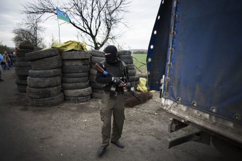 A pro-Russian militant is seen at the roadblock near Slovyansk on April 20.