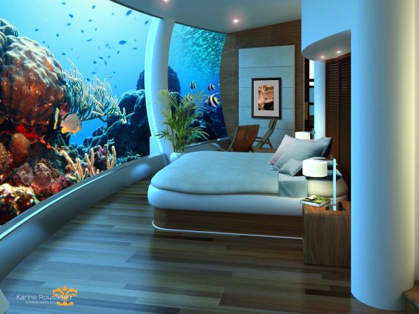 Guests here are invited to interact with the surroundings -- at the push of a button the fish are fed, and the flip of a switch turns on sparkling underwater lights. 