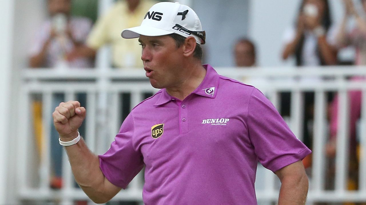 Lee Westwood celebrates after winning the Malaysian Open in Kuala Lumpur for the second time.
