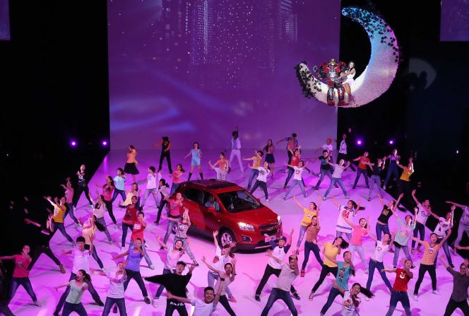 Dancers perform during Chevrolet's gala evening held ahead of the Beijing Auto Show. The exhibition of fashionable high-end cars features more than a thousand vehicles and is open to the public until April 29.