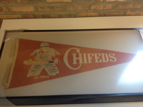 This 100-year-old pennant was made for the Chicago Federal League baseball team, the Chicago Whales. The Chi-Feds, as they were known, were the original occupants of Wrigley Field, which was called Weeghman Park when it opened in 1914. It was named Wrigley Field in 1926. <a href="index.php?page=&url=http%3A%2F%2Fireport.cnn.com%2Fdocs%2FDOC-1120411">Peter LaSorsa</a> purchased the rare pennant for his baseball memorabilia collection.
