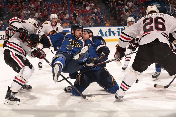 No. 9, Jaden Schwartz of the St. Louis Blues, falls to the ice after a face off against the Chicago Blackhawks in the first round of the 2014 Stanley Cup Playoffs on April 19 in St. Louis.