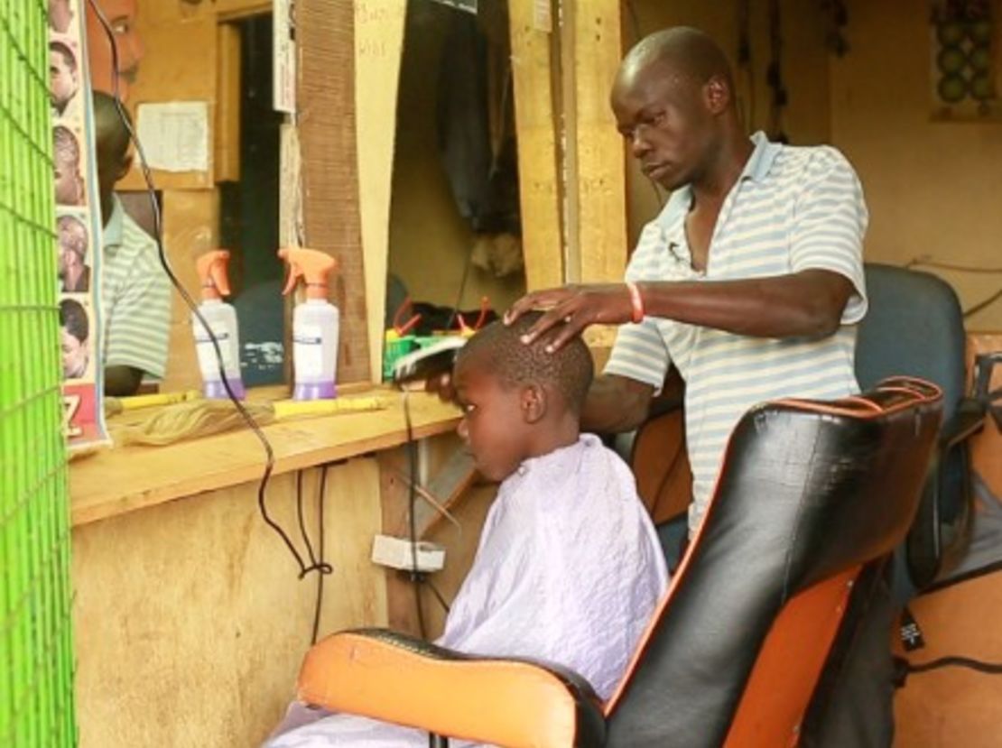Buken Makokha inside his barbershop.