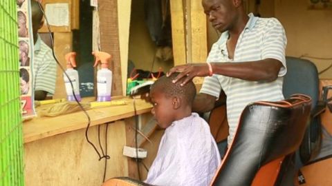 Buken Makokha inside his barbershop.
