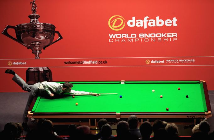 England's Mark Selby plays Michael White of Wales during day four of the the Dafabet World Championship at Crucible Theater on April 21 in Sheffield, England.