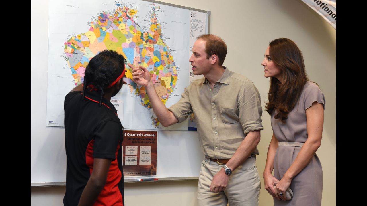 The royal couple look at an aboriginal map showing the location of indigenous language groups before European settlement during a visit to the National Indigenous Training Academy at Yulara in Ayers Rock, Australia, on April 22.