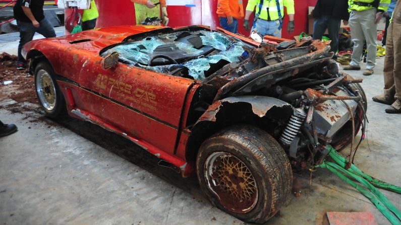 After workers hauled the PPG from the hole, it became apparent the Corvette had been chopped by a large slab of concrete, according to GM. This photo shows that its rear panels have gone missing. 