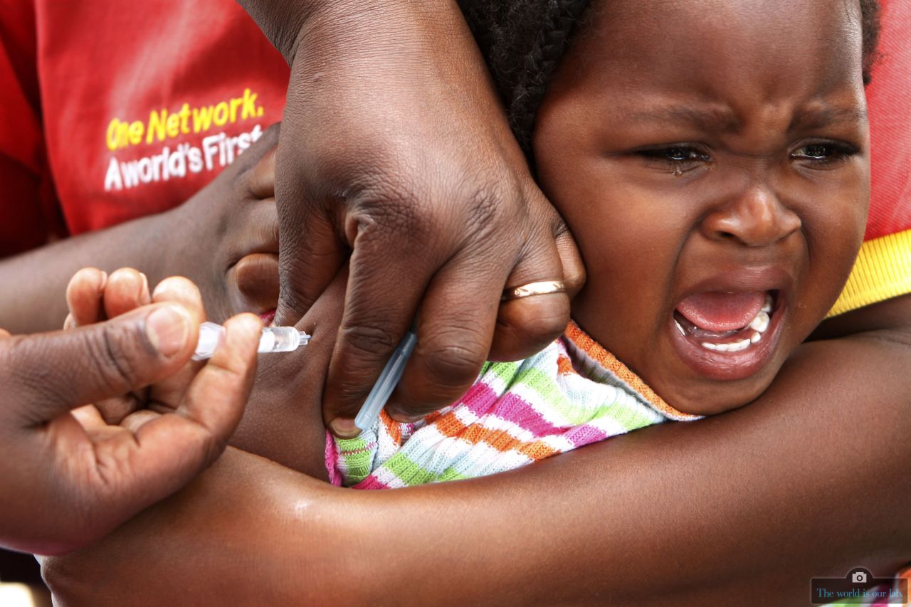 Two-year old Doris Nyambura cries as she receives a dose of measles vaccination during the launching of a vaccination exercise in Rongai, Nairobi.