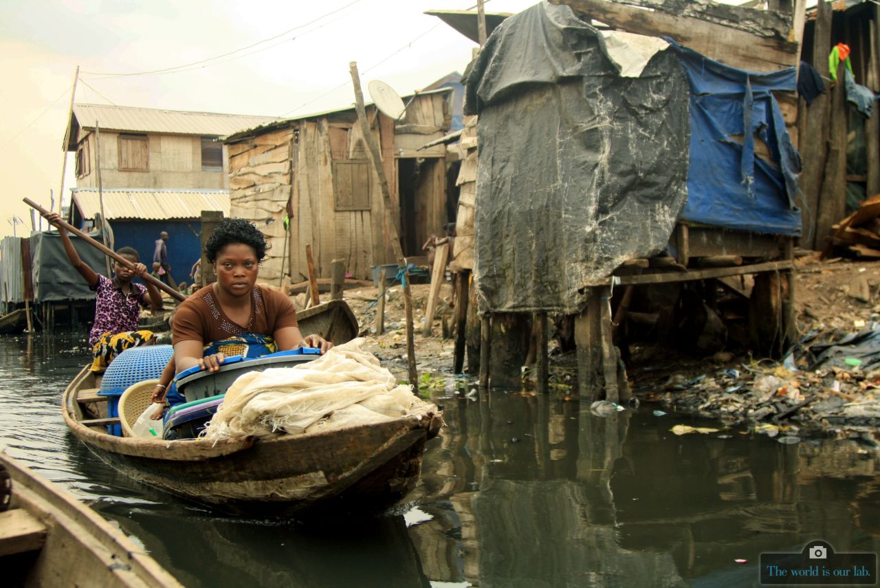 This image shows day-to-day life in Makoko, one of Nigeria's biggest and best known slums. Most of Makoko rests on stilts above the Lagos Lagoon. It has an estimated 85,840 residents many of whom are fishermen.