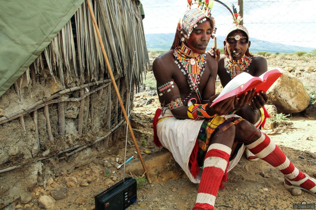 In "Bible Study," Kevin Amunze shows a rural tribe using radio to learn. Because of its low cost and accessibility, radio is still the biggest media in Africa and in often plays a vital role in education.