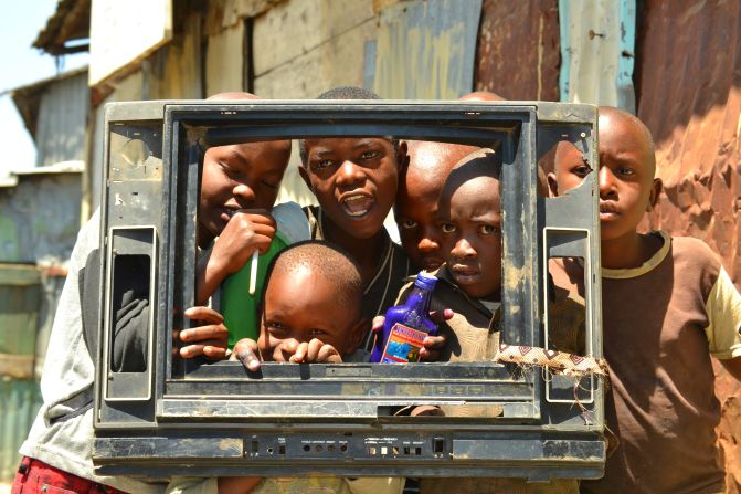 Entrants to IBM's The World Is Our Lab photo competition sent images highlighting Africa's biggest challenges and opportunities. Lawrence "Shabu" Mwangi won with an image he took of children playing with the plastic frame of an old TV in the Mukuru slum in Nairobi. 