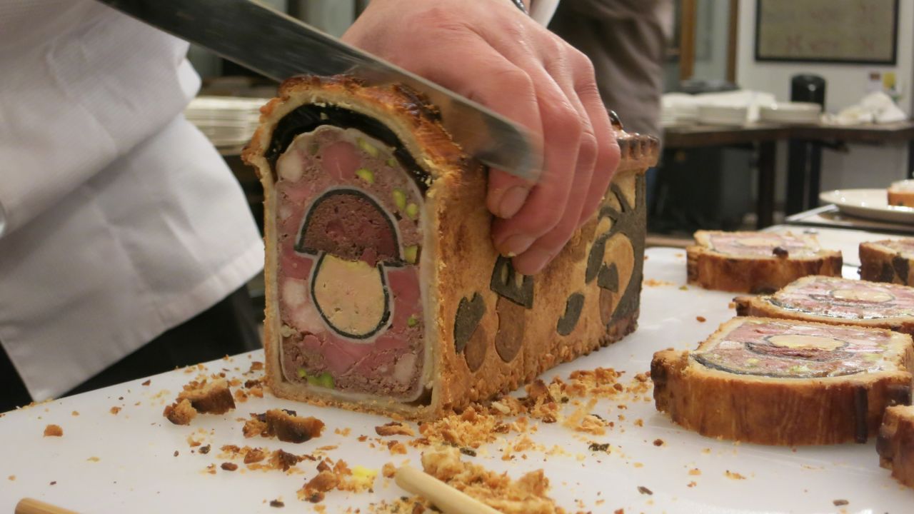 Bourdain travels to the gastronomic capital of Lyon, France, to dine on "some of the greatest food on earth," like this pâté en croûte.