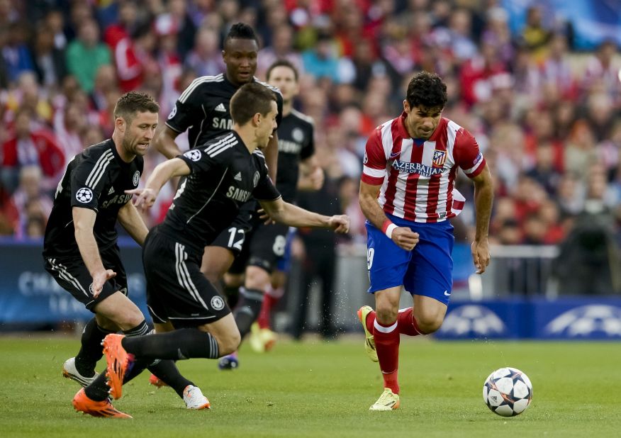 Atletico Madrid dangerman Costa is surrounded by Chelsea defenders as he attempts to attack the visiting goal.