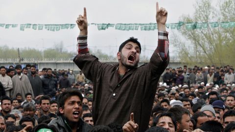 A supporter of the Peoples Democratic Party shouts slogans during an election campaign rally on the outskirts of Srinagar on April 17. Several separatist organizations have jointly appealed to the people of Jammu and Kashmir to boycott the Indian parliamentary elections. 
