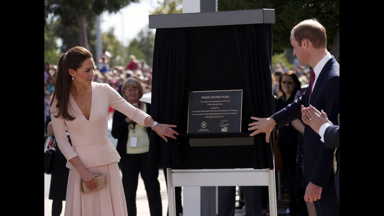 Prince William and his wife unveil a plaque naming a plaza after their son, Prince George, outside the Playford Civic Centre in Adelaide on April 23. 