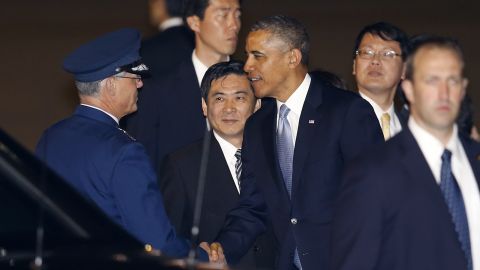 U.S. President Barack Obama arrives Wednesday at Haneda International Airport in Tokyo. 