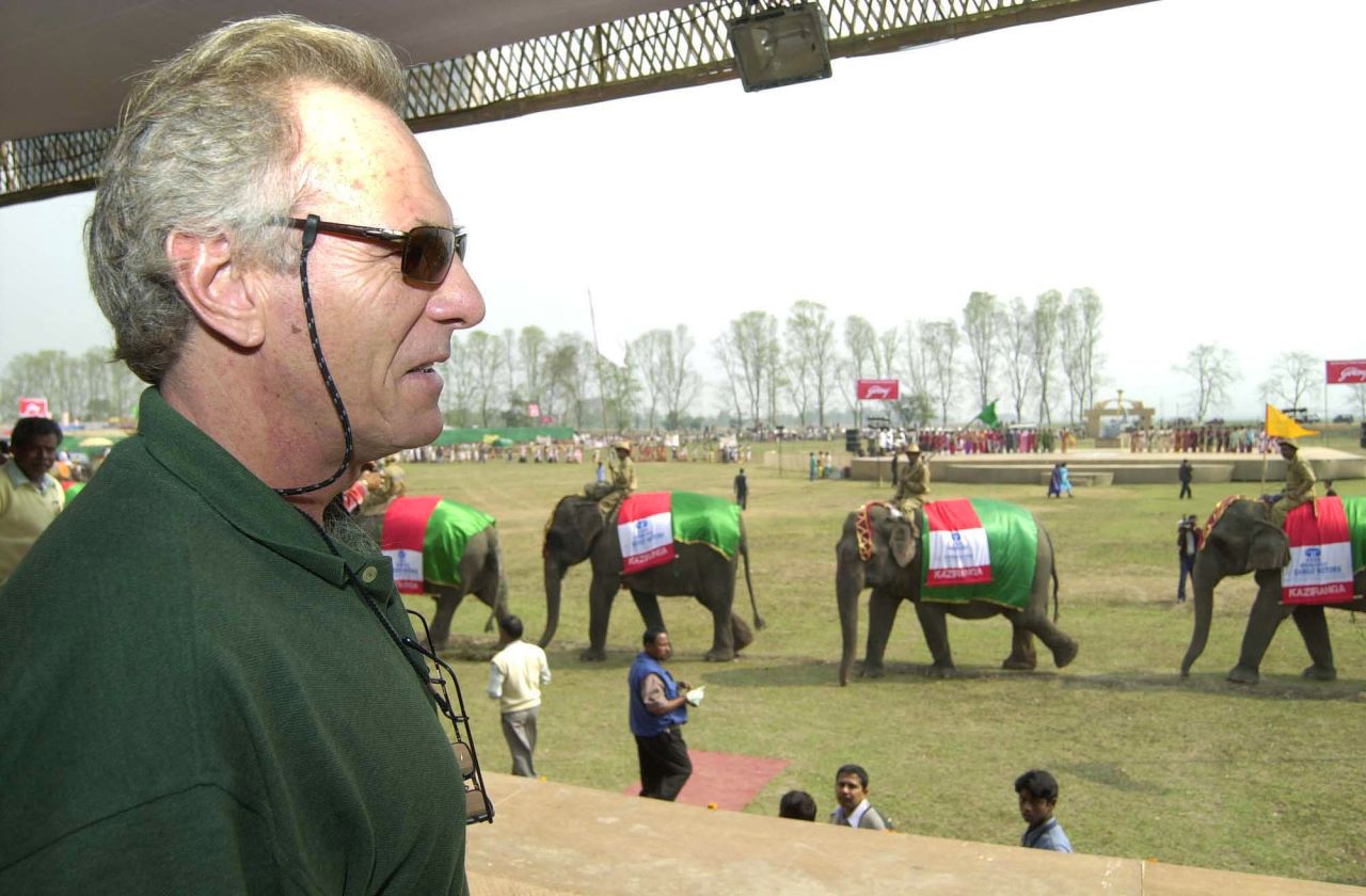 Shand, brand ambassador for Kaziranga National Park, watches as elephants parade during the park's centenary celebration in Kaziranga, India, on February 12, 2005.